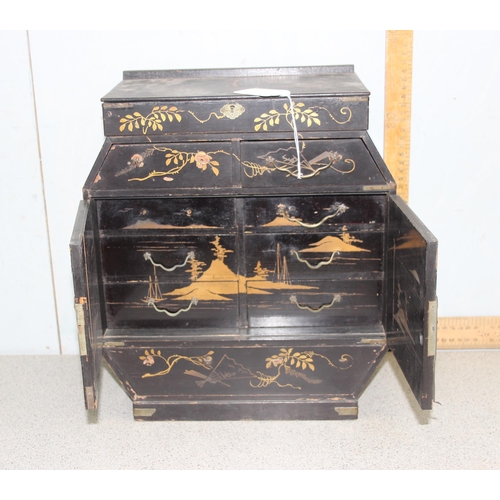 284 - Japanese lacquered table top collectors chest with 6 internal drawers, approx 33cm wide