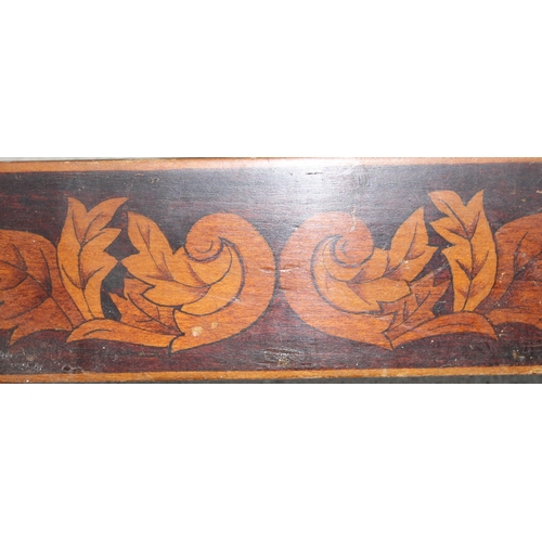 285 - Sheraton inlayed mahogany book trough and a pair carved bellows with grapevine detail