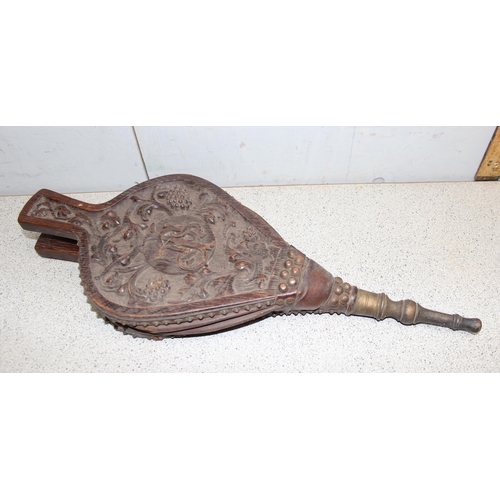 285 - Sheraton inlayed mahogany book trough and a pair carved bellows with grapevine detail