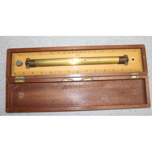 703 - Harling of London boxed brass and wood calibrated marine rolling ruler 38cm wide and a 4 piece boxed... 