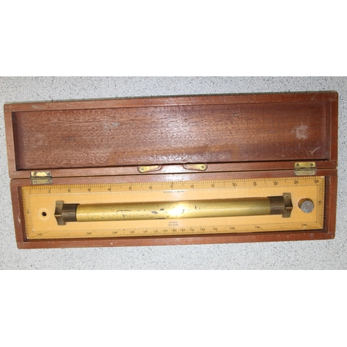 703 - Harling of London boxed brass and wood calibrated marine rolling ruler 38cm wide and a 4 piece boxed... 