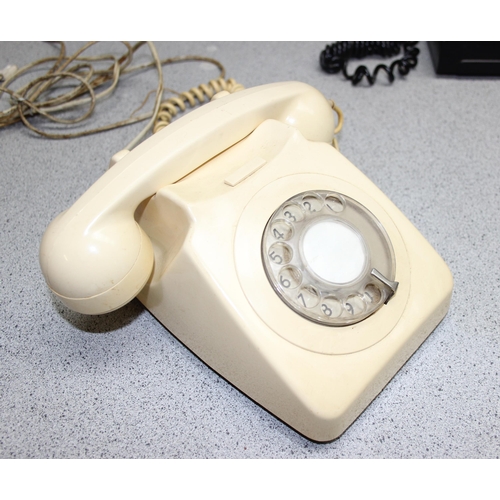 706 - 2 Bakelite GPO telephones and a later cream example