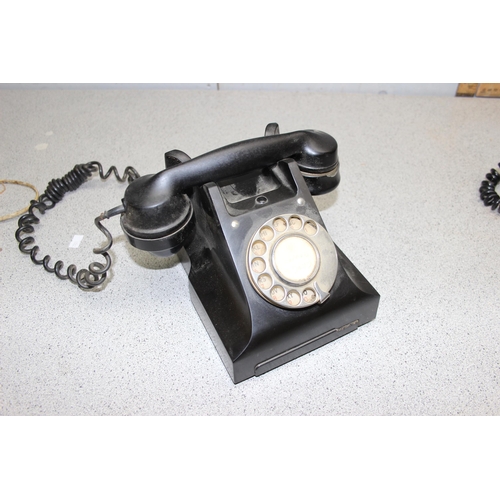 706 - 2 Bakelite GPO telephones and a later cream example