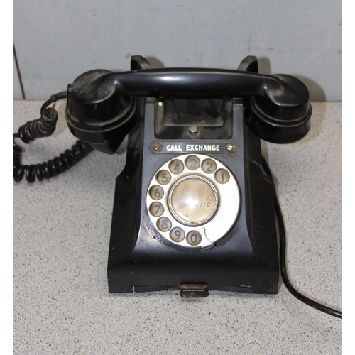 706 - 2 Bakelite GPO telephones and a later cream example