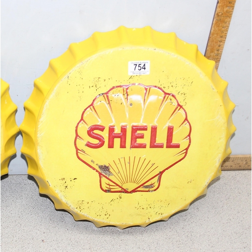 754 - Pair of large bottle top shaped iconic ‘Shell’ petrol wall signs with fixings, 40cm diameter.