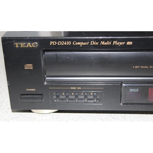 802 - Qty of audio equipment to include a TEAC PD-D2410 compact disc 5 changer and a Altec Lansing iPhone ... 