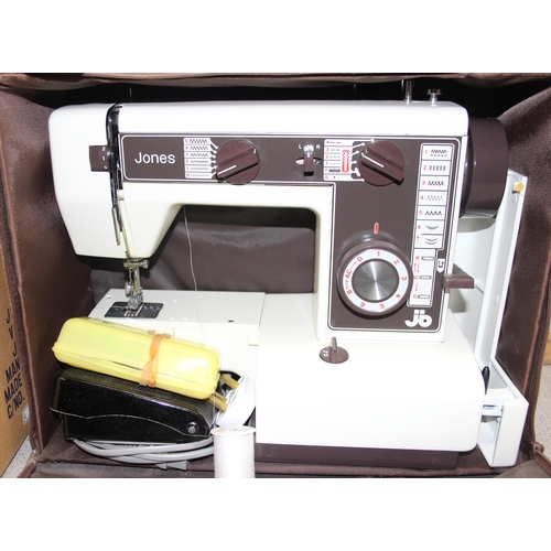 863 - Boxed and cased Jones VX560 sewing machine