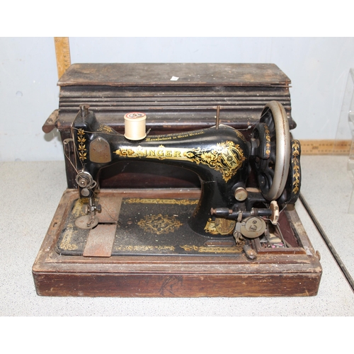 867 - 2 vintage sewing machines to include a Nelson 61 and a Singer both hand cranked.