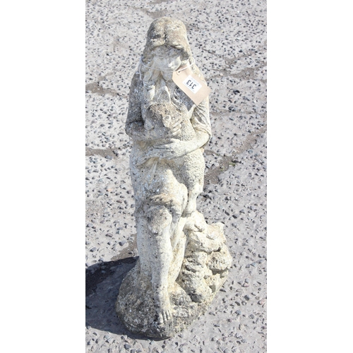 313 - Large stone garden statue of a woman with a dog, approx 75cm tall