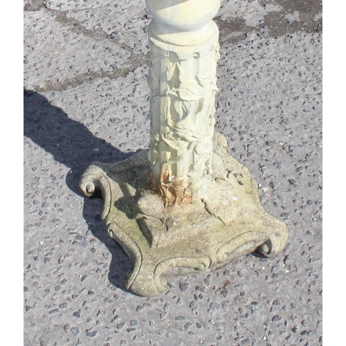 316 - Cast stone sundial on plinth with climbing leaves and woodland decoration, approx 75cm tall