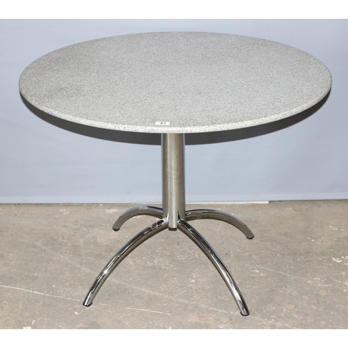 57 - A retro style table with grey marble or granite top and a space age style chrome base, the top appro... 