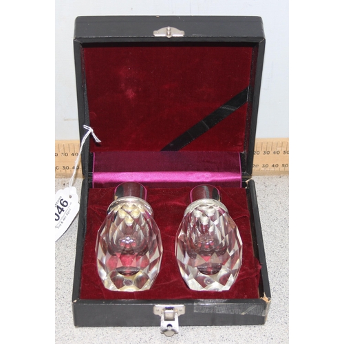 1012 - A pair of heavy silver plate and cut glass salt and pepper shakers in box by Post House of Japan