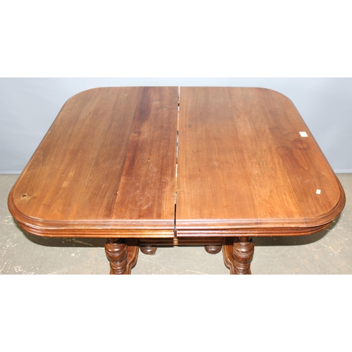 95 - A late 19th century or early 20th century French extending walnut dining table with impressive turne... 