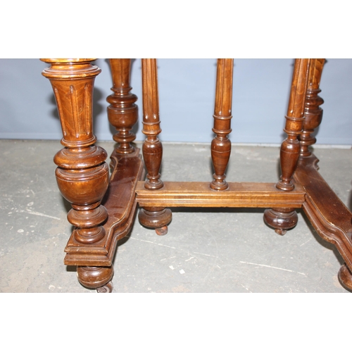 95 - A late 19th century or early 20th century French extending walnut dining table with impressive turne... 