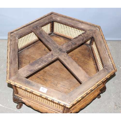 97 - An unusual vintage hexagonal low table with carved oak frame and bergere sides, approx 66cm wide