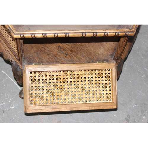 97 - An unusual vintage hexagonal low table with carved oak frame and bergere sides, approx 66cm wide