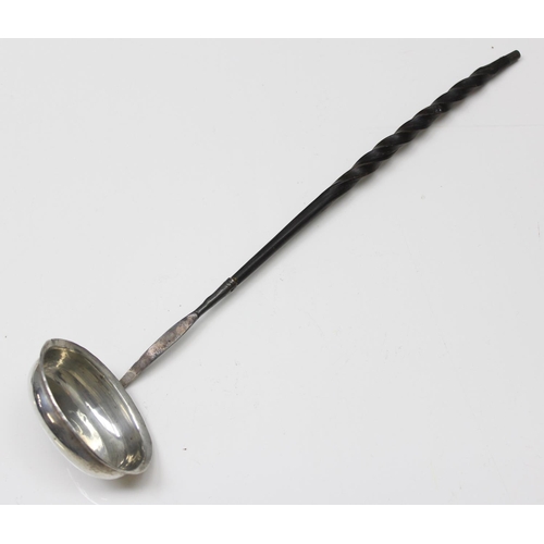 1016 - An early 19th century silver toddy ladle with twisted whalebone handle, unmarked but XRF tested as s... 