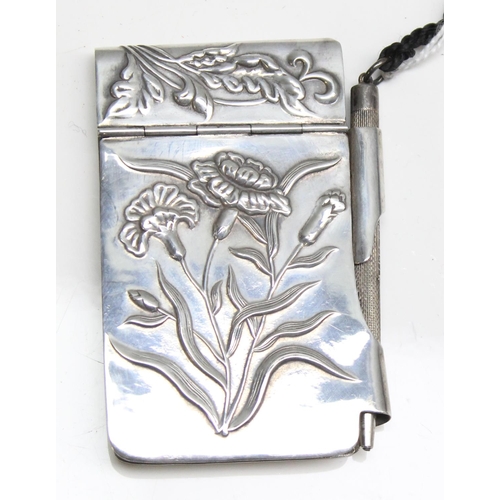 1030 - An Art Nouveau style silver aide memoire with silver pencil, the book marked for London 1994