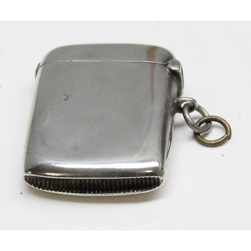 1031 - An antique plain silver vesta case, Chester 1902 by Cohen & Charles