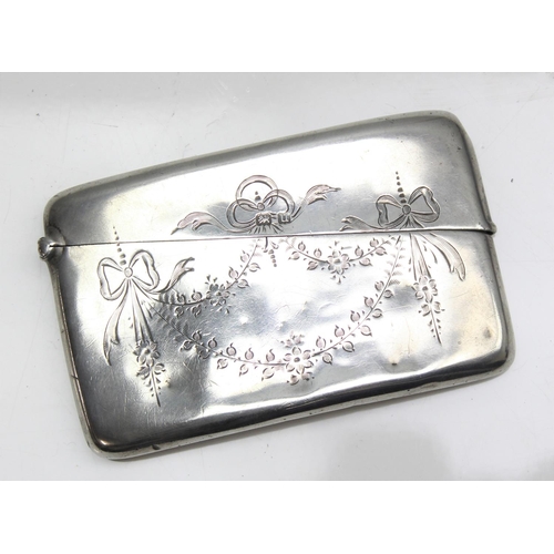 1032 - An antique silver card case with engraved swag decoration, Birmingham 1919, approx 55.31g gross