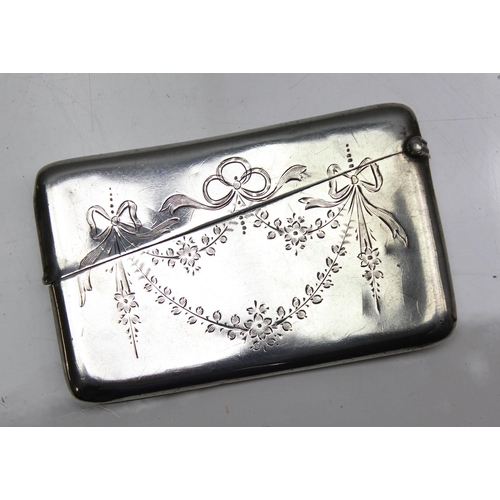 1032 - An antique silver card case with engraved swag decoration, Birmingham 1919, approx 55.31g gross