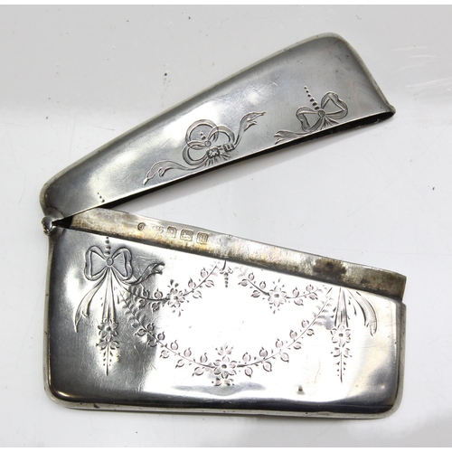 1032 - An antique silver card case with engraved swag decoration, Birmingham 1919, approx 55.31g gross