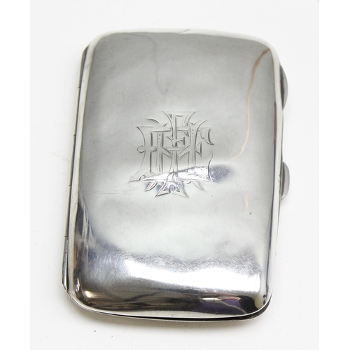 1034 - An early 20th century silver cigarette case with engraved initials and plain finish, Birmingham 1910... 