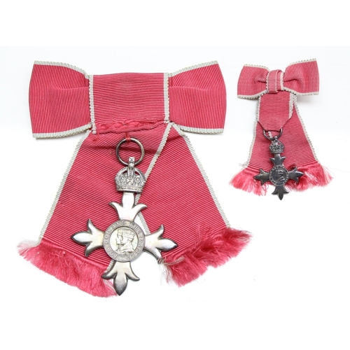 1405 - A Ladies Civilian MBE in a Royal Mint case of issue, complete with ribbon in bow form and a matching... 