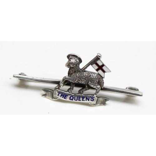 1406 - A silver and enamel military sweetheart brooch or badge to the Queen's Surrey Regiment, unmarked but... 