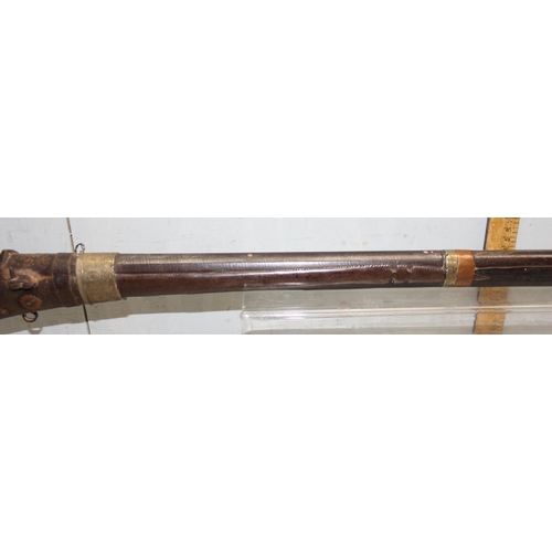 1413 - Antique North African Moukhala rifle mounted with silver, the mounts XRF tested approx 65% pure, the... 