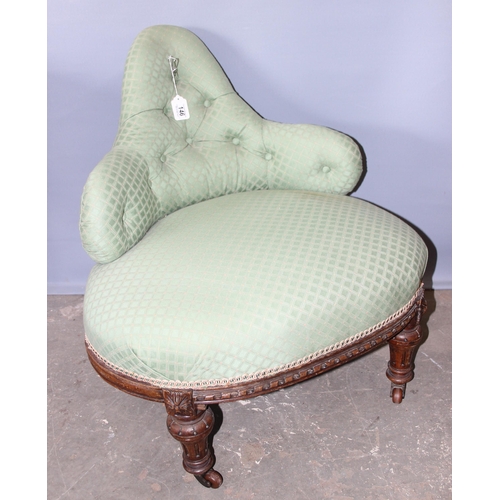 146 - Antique corner nursing chair on castors with button back green upholstery