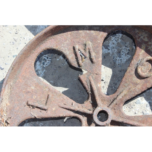 327 - 4 cast iron cartwheels marked 'Wilmot' on the spokes