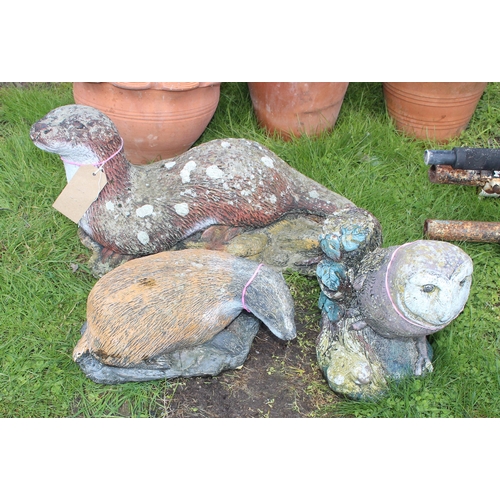 330 - 3 painted concrete garden ornaments to include an Owl, Otter and a Badger