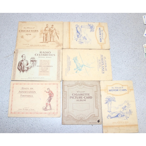 564 - A large qty of assorted cigarette and tea cards, many in albums