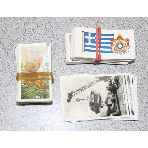 564 - A large qty of assorted cigarette and tea cards, many in albums