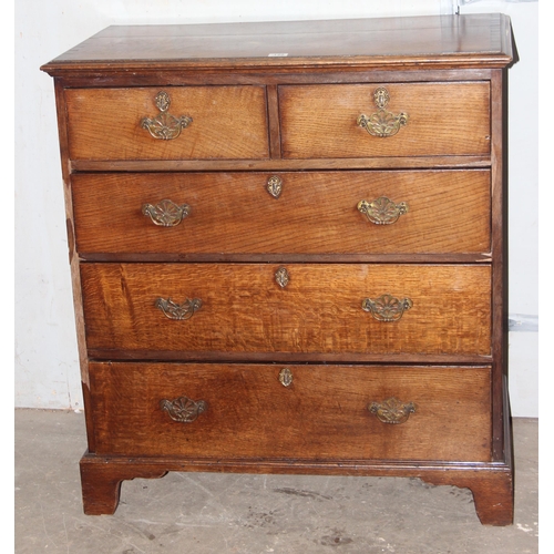 149 - An antique oak 2 over 3 chest of drawers with brass handles, approx 96cm wide