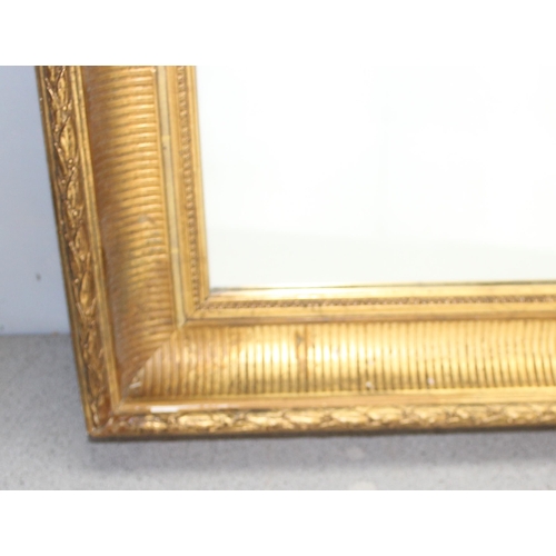 470 - A large antique gilt framed mirror, approx 87cm x 66cm