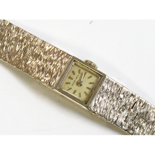 1315 - A retro 9ct gold cased ladies cocktail watch by Bueche-Girod, with retro 9ct gold bark effect strap,... 