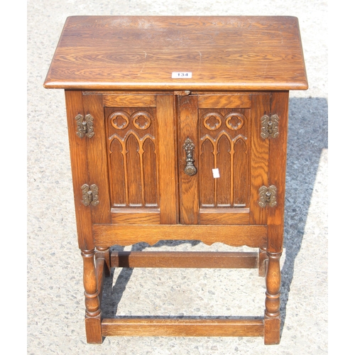 134 - Early 20th century carved oak pot cupboard, approx 50cm wide