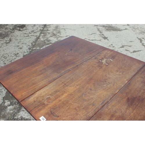 154 - A 19th century mahogany dropleaf table standing on pad feet, approx 150cm x 105cm when leaves raised