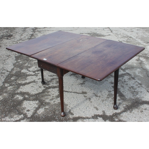 154 - A 19th century mahogany dropleaf table standing on pad feet, approx 150cm x 105cm when leaves raised