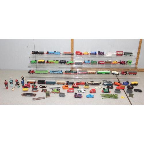 1534 - A large qty of toy trains, mainly Thomas the Tank Engine by Ertl etc