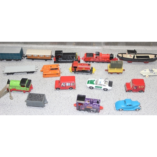 1534 - A large qty of toy trains, mainly Thomas the Tank Engine by Ertl etc