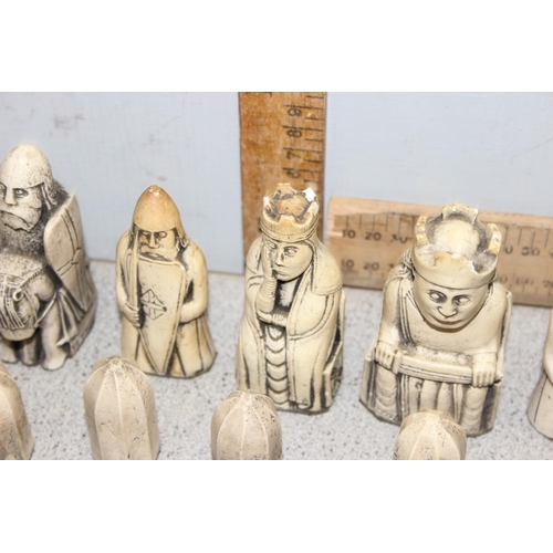 1536 - A vintage chess set modelled as the Lewis (Uig) Chessmen, a 12th century chess set found on the Isle... 