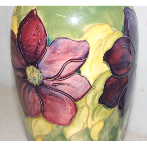 253 - A large vintage Moorcroft Clematis pattern table lamp, approx 35cm tall