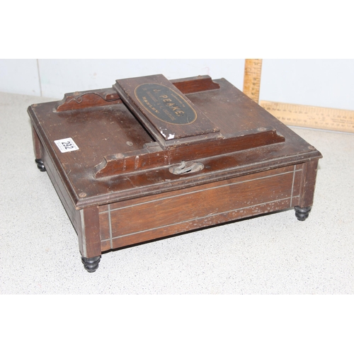 292 - An unusual wooden cased item manufactured for J. Peake of 23 Piccadilly & 4 Cheapside Hanley, possin... 