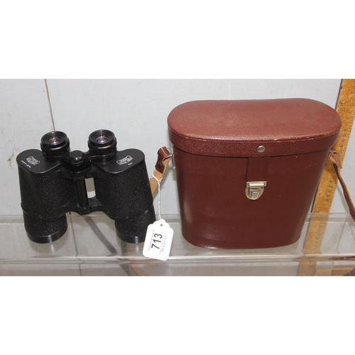 713 - A pair of Carl Zeiss Jena Jenoptem 10x50W binoculars in case