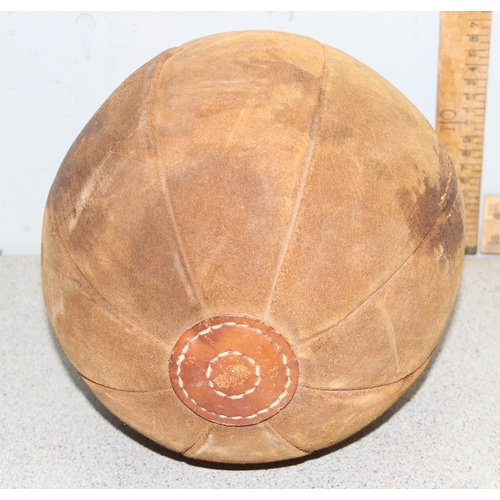 772 - A vintage leather medicine ball, approx 30cm in diameter