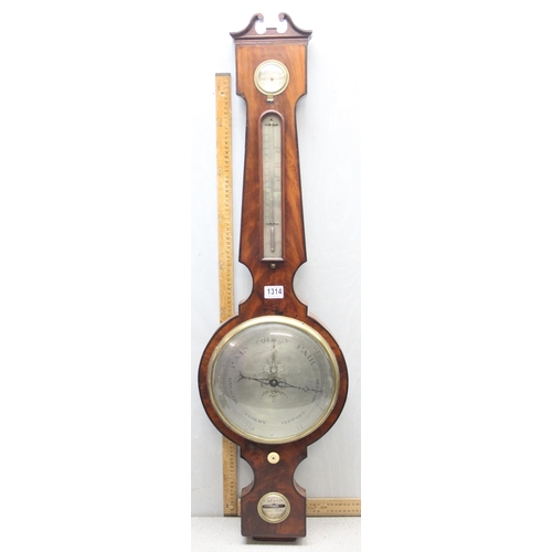 1314 - A 19th century mahogany cased wheel barometer, the broken swan neck pediment above a hygrometer, the... 