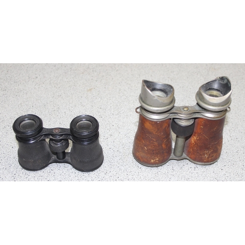 701 - 2 pairs of antique field glasses or binoculars, one pair possibly a WW1 private purchase pair